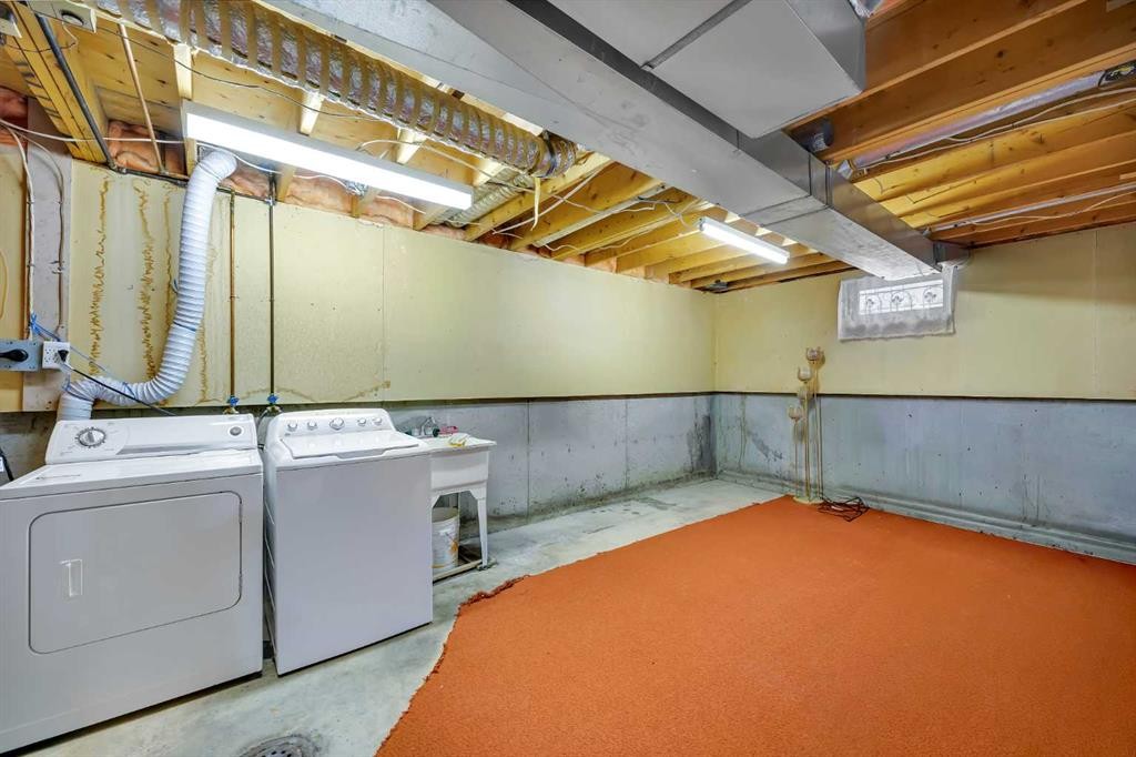 12 Whitaker Close Ne, Calgary, AB - Indoor Photo Showing Laundry Room
