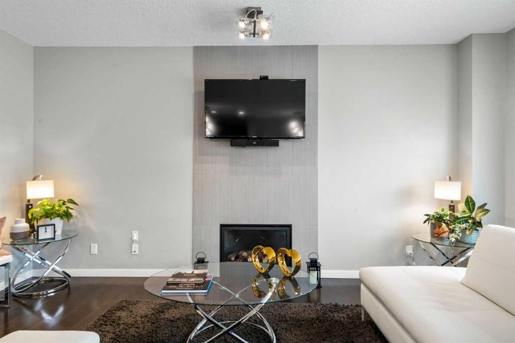 236 Walden Heights Se, Calgary, AB - Indoor Photo Showing Living Room With Fireplace