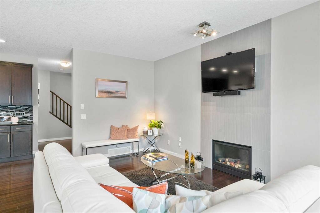 236 Walden Heights Se, Calgary, AB - Indoor Photo Showing Living Room With Fireplace