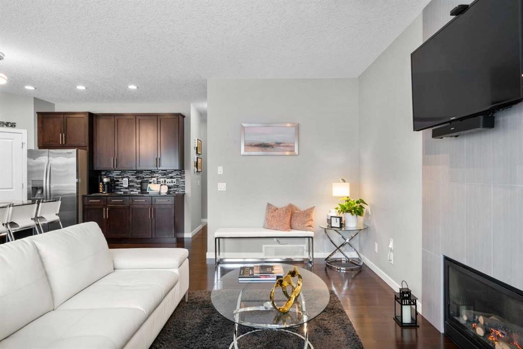 236 Walden Heights Se, Calgary, AB - Indoor Photo Showing Living Room With Fireplace