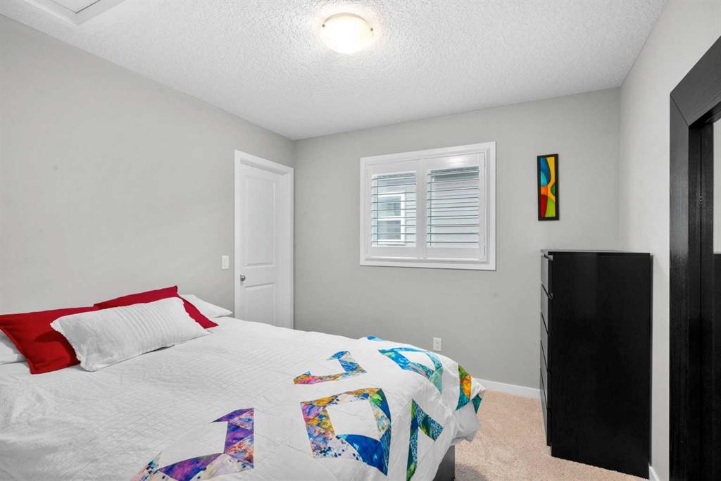 236 Walden Heights Se, Calgary, AB - Indoor Photo Showing Bedroom