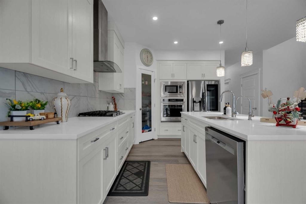 208-- Dawson Harbour Heights, Chestermere, AB - Indoor Photo Showing Kitchen With Upgraded Kitchen