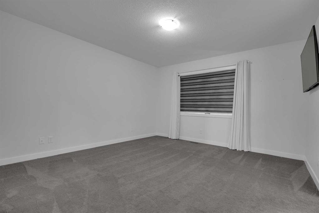 208-- Dawson Harbour Heights, Chestermere, AB - Indoor Photo Showing Other Room