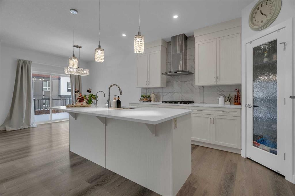 208-- Dawson Harbour Heights, Chestermere, AB - Indoor Photo Showing Kitchen With Upgraded Kitchen