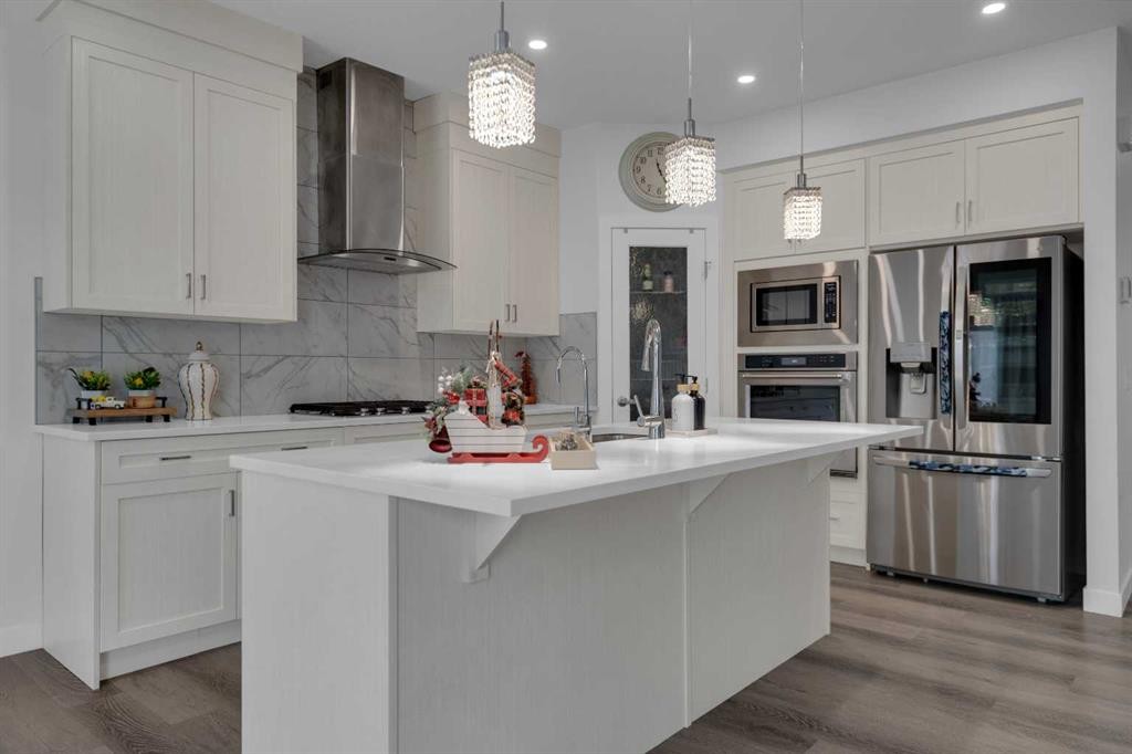 208-- Dawson Harbour Heights, Chestermere, AB - Indoor Photo Showing Kitchen With Upgraded Kitchen
