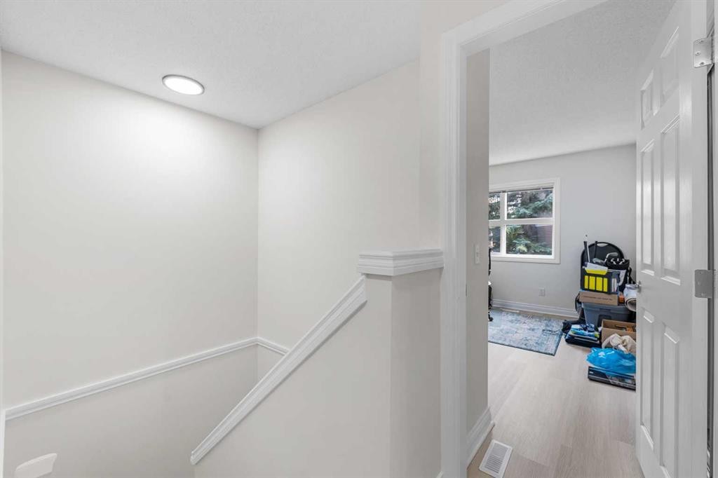 27 Cedarwood Lane Sw, Calgary, AB - Indoor Photo Showing Other Room