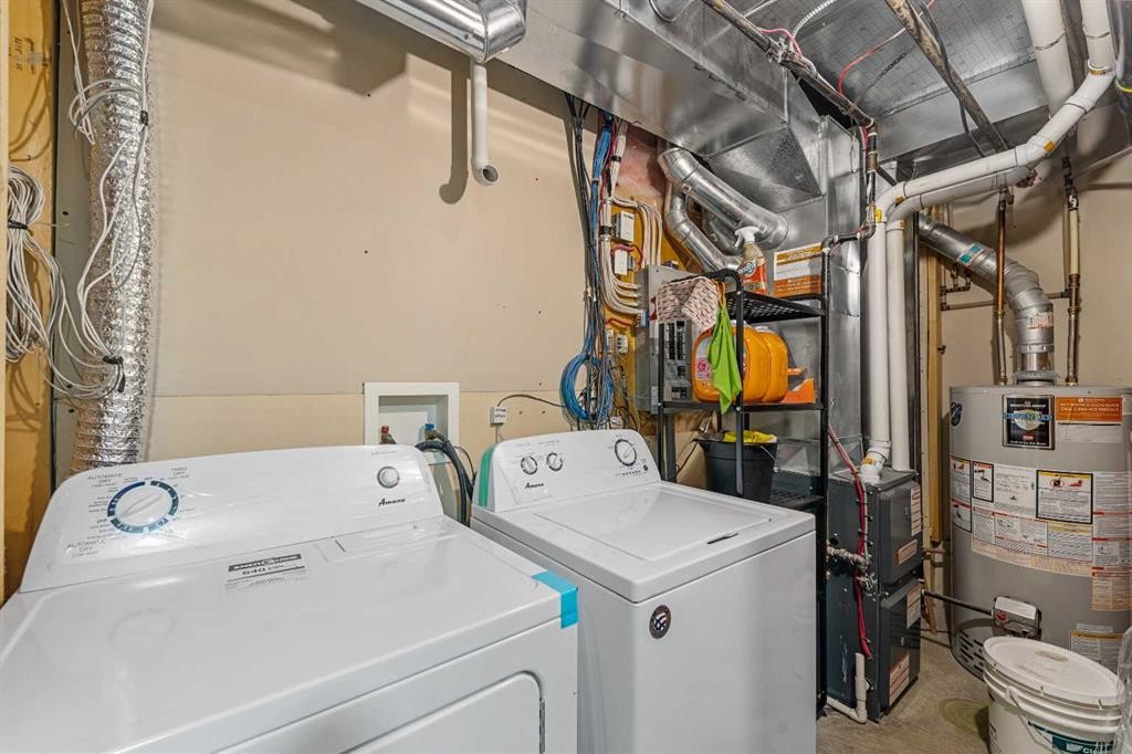 27 Cedarwood Lane Sw, Calgary, AB - Indoor Photo Showing Laundry Room