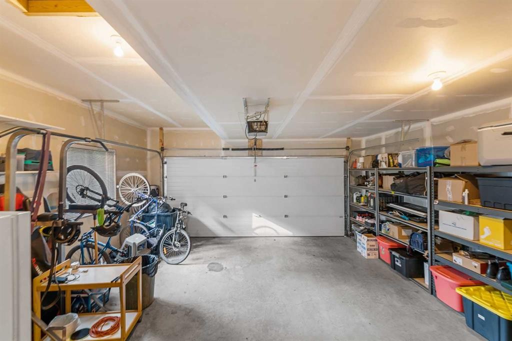 27 Cedarwood Lane Sw, Calgary, AB - Indoor Photo Showing Garage
