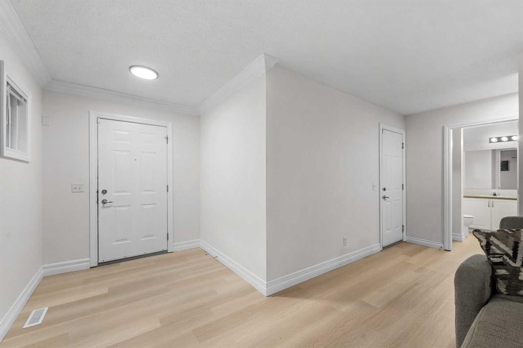 27 Cedarwood Lane Sw, Calgary, AB - Indoor Photo Showing Other Room