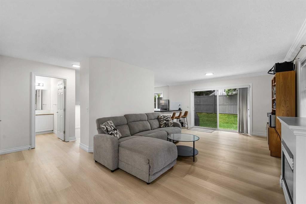 27 Cedarwood Lane Sw, Calgary, AB - Indoor Photo Showing Living Room