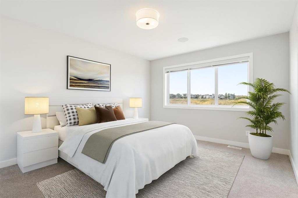 99 Precedence Hill, Cochrane, AB - Indoor Photo Showing Bedroom