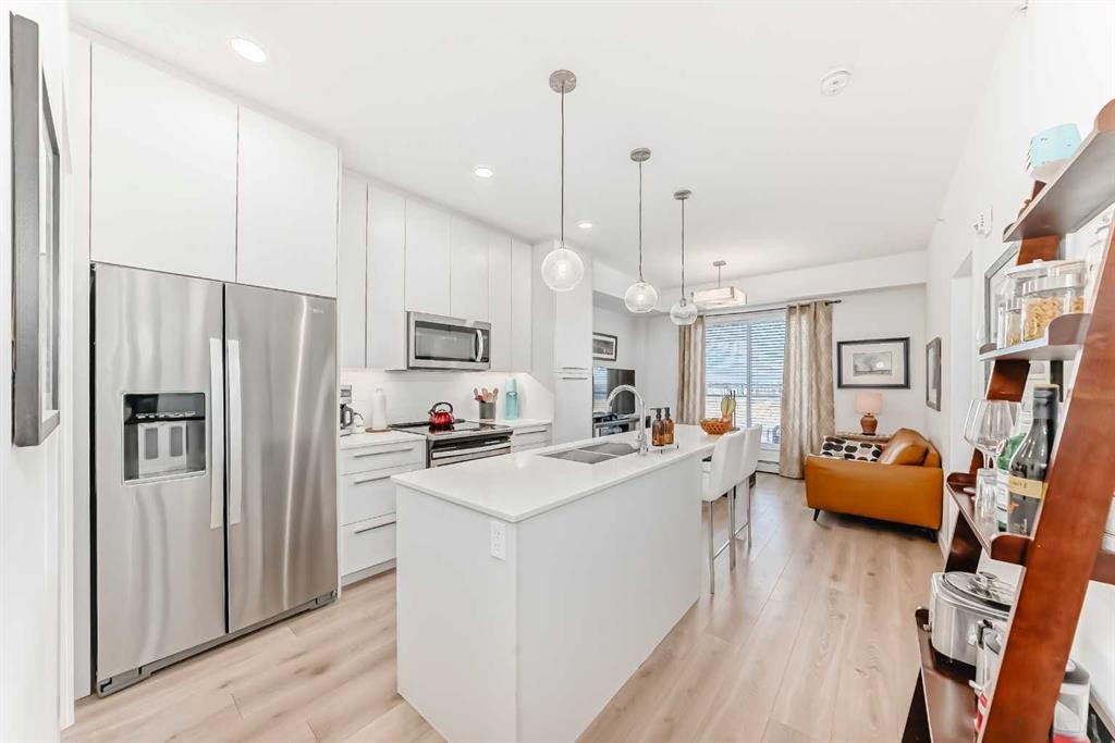 1406-76 Cornerstone Passage Ne, Calgary, AB - Indoor Photo Showing Kitchen With Stainless Steel Kitchen With Upgraded Kitchen