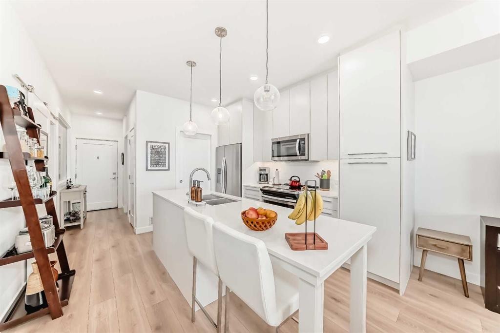 1406-76 Cornerstone Passage Ne, Calgary, AB - Indoor Photo Showing Kitchen With Double Sink With Upgraded Kitchen