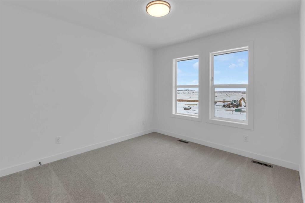 1325 South Point Parade Sw, Airdrie, AB - Indoor Photo Showing Other Room