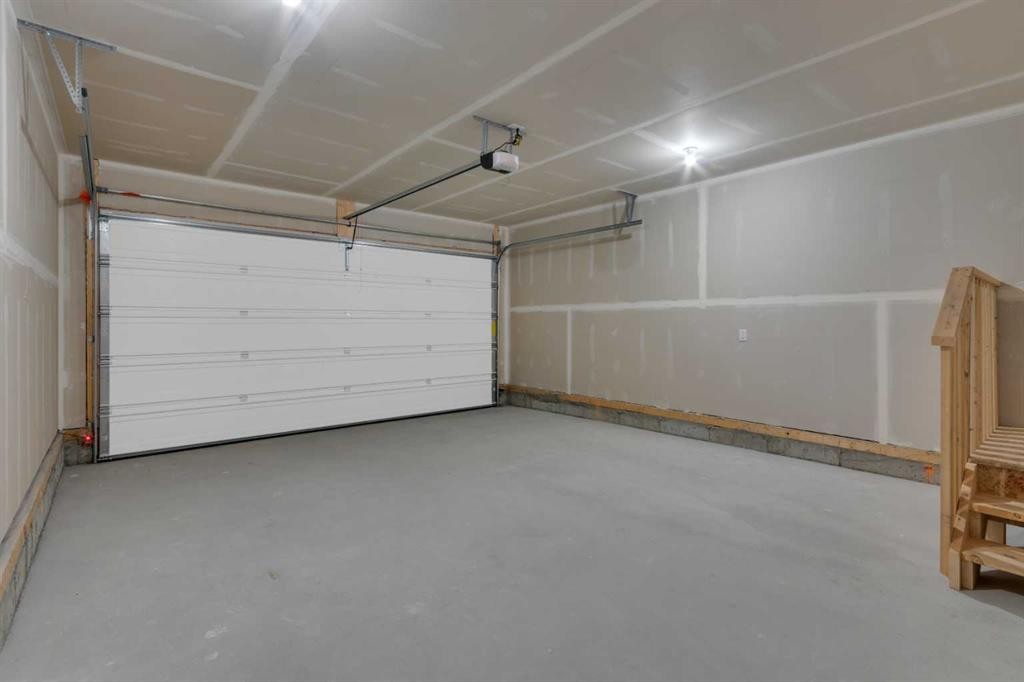 1325 South Point Parade Sw, Airdrie, AB - Indoor Photo Showing Garage
