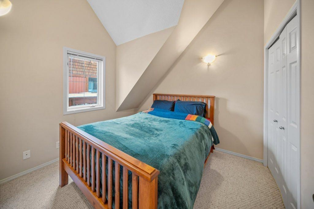 304-343 Marten Street, Banff, AB - Indoor Photo Showing Bedroom