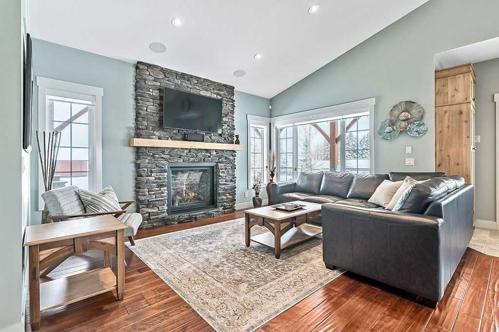 349035 Tamarack Drive East, Rural Foothills County, AB - Indoor Photo Showing Living Room With Fireplace