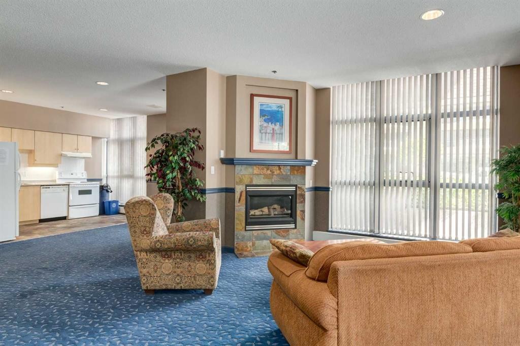 604-650 10 Street Sw, Calgary, AB - Indoor Photo Showing Living Room With Fireplace
