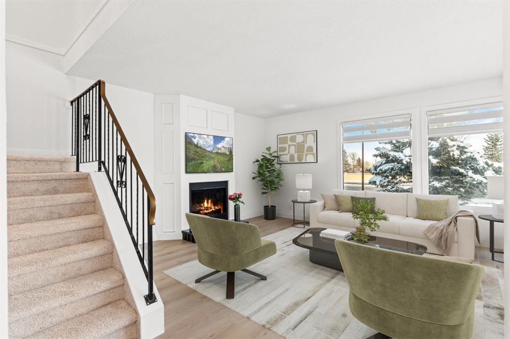 111 Macewan Glen Close Nw, Calgary, AB - Indoor Photo Showing Living Room With Fireplace