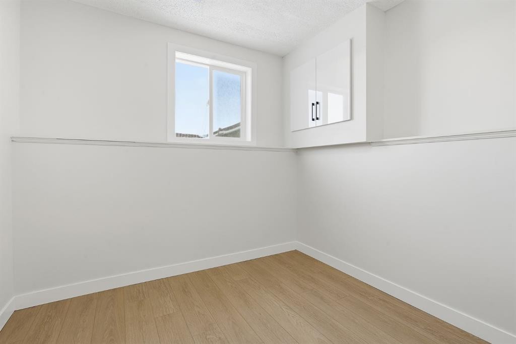 96 Falshire Drive Ne, Calgary, AB - Indoor Photo Showing Other Room