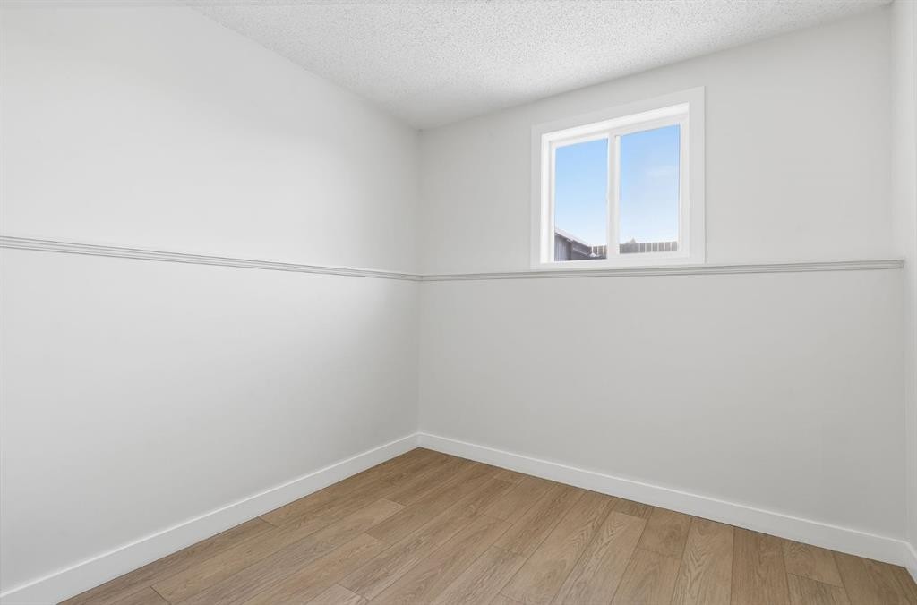 96 Falshire Drive Ne, Calgary, AB - Indoor Photo Showing Other Room