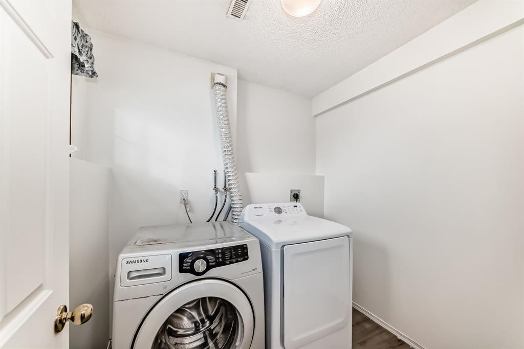34 Erin Meadow Close Se, Calgary, AB - Indoor Photo Showing Laundry Room
