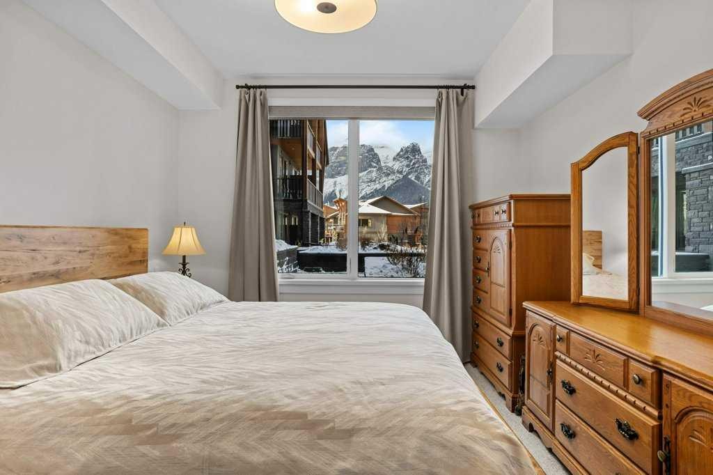 107-1315 Spring Creek Gate, Canmore, AB - Indoor Photo Showing Bedroom