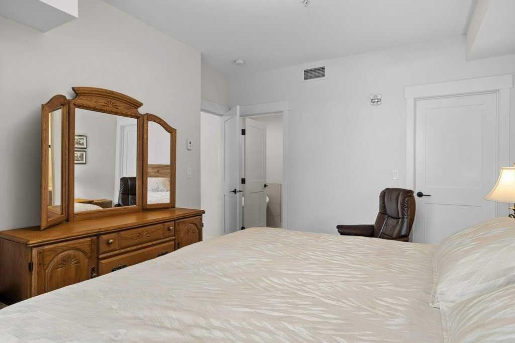 107-1315 Spring Creek Gate, Canmore, AB - Indoor Photo Showing Bedroom