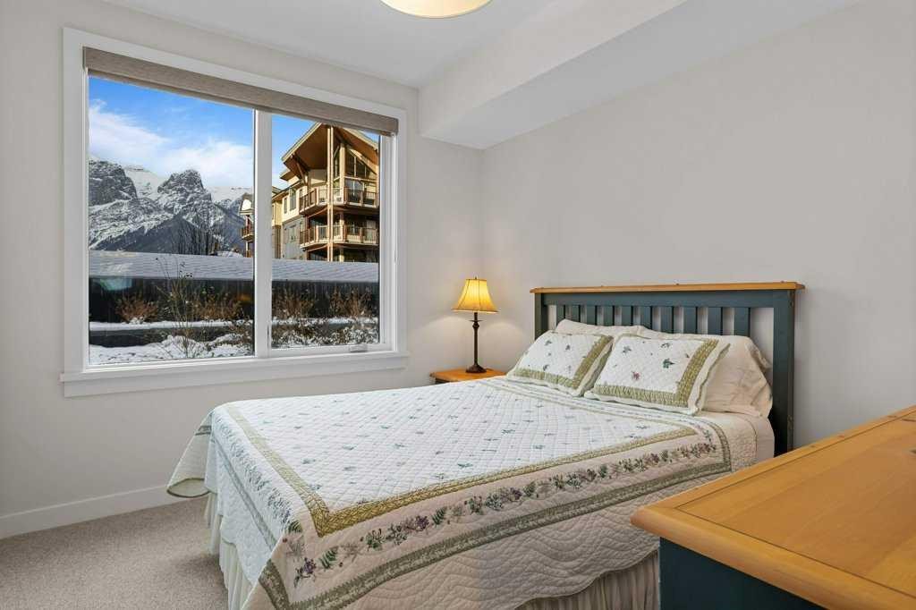 107-1315 Spring Creek Gate, Canmore, AB - Indoor Photo Showing Bedroom