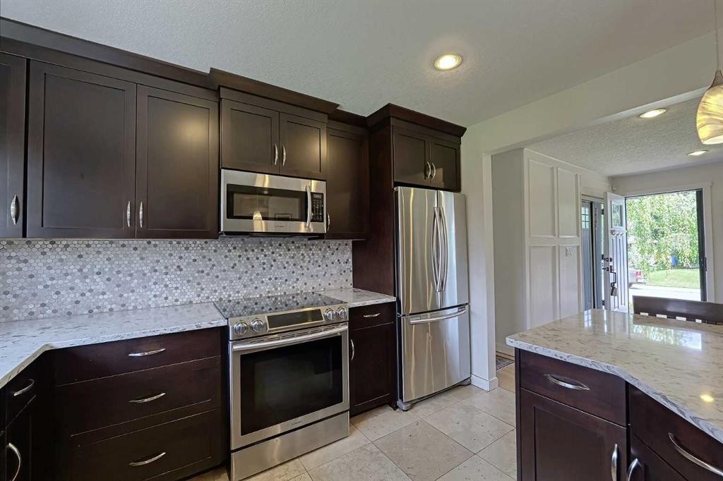 51 Hollyburn Road Sw, Calgary, AB - Indoor Photo Showing Kitchen With Upgraded Kitchen