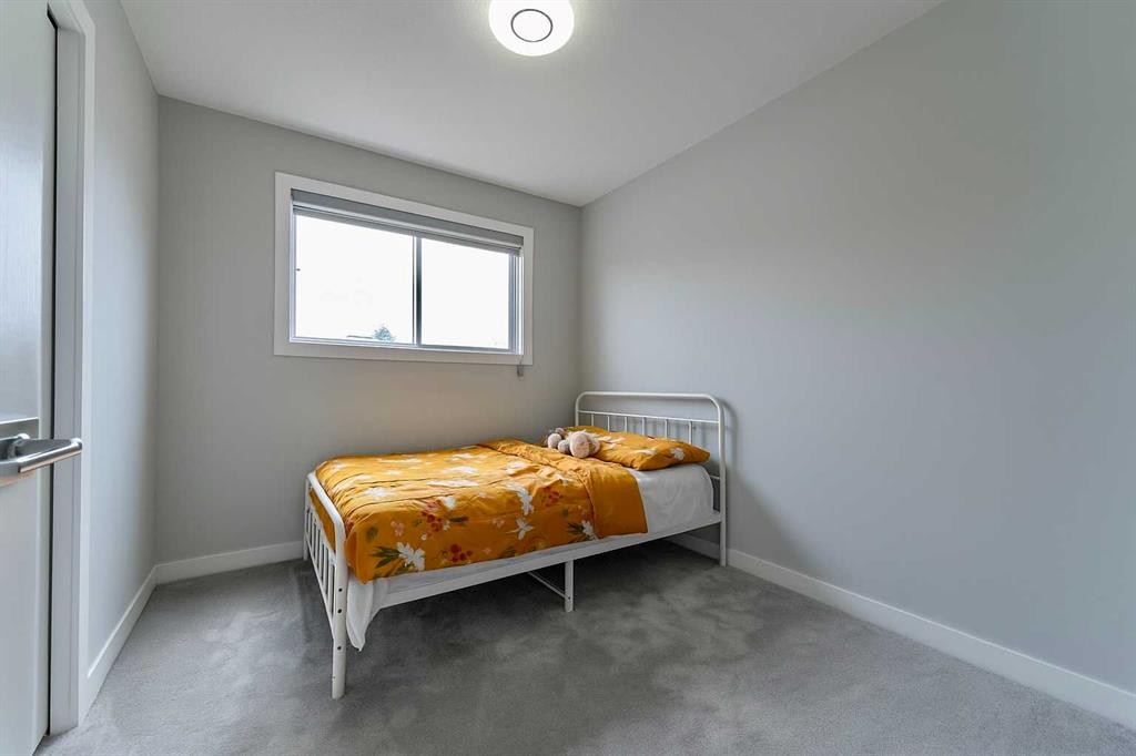 36 Whitehaven Road Ne, Calgary, AB - Indoor Photo Showing Bedroom