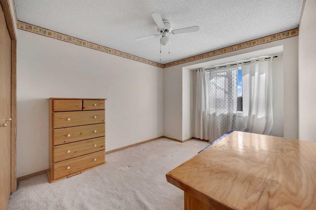 137 Martinpark Way Ne, Calgary, AB - Indoor Photo Showing Other Room