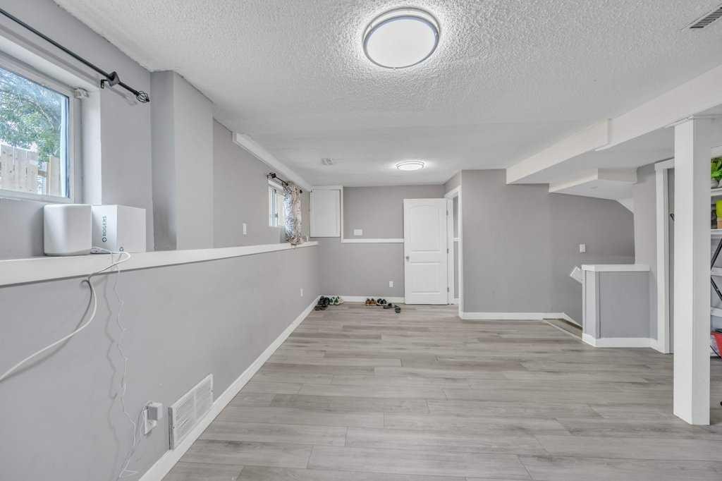 32 Martindale Boulevard Ne, Calgary, AB - Indoor Photo Showing Other Room