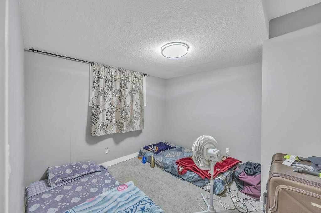 32 Martindale Boulevard Ne, Calgary, AB - Indoor Photo Showing Bedroom