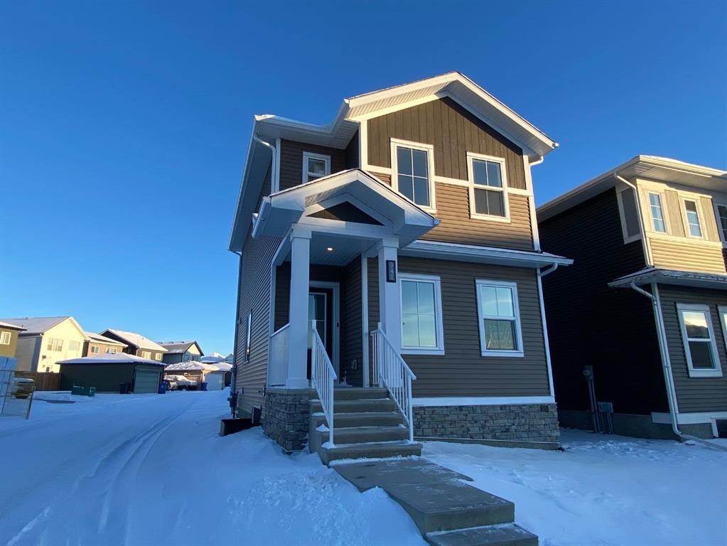 341 Ellen Park, Crossfield, AB - Outdoor With Facade