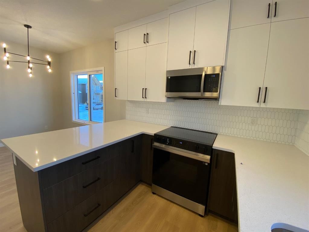 341 Ellen Park, Crossfield, AB - Indoor Photo Showing Kitchen