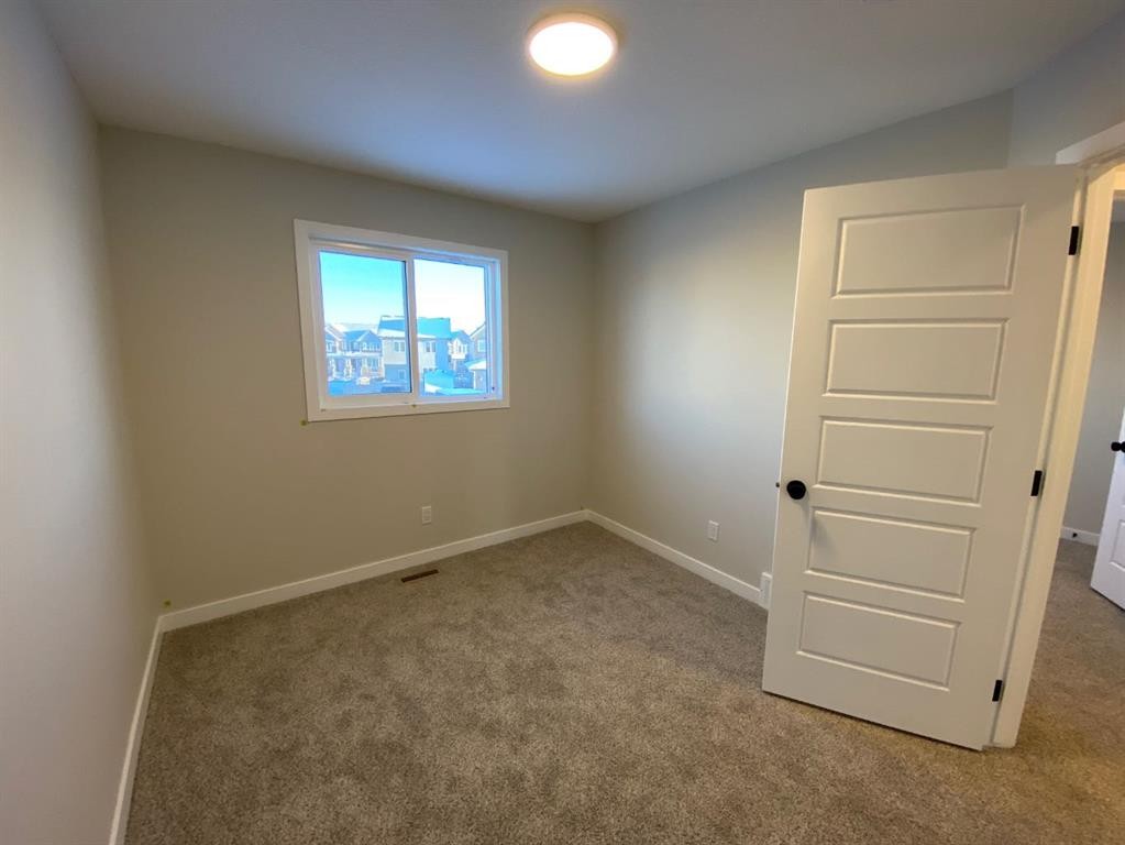 341 Ellen Park, Crossfield, AB - Indoor Photo Showing Other Room