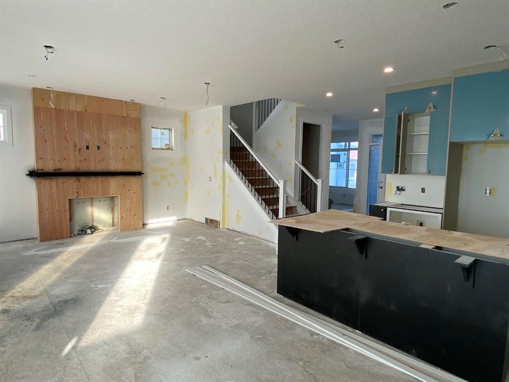 40 Fieldstone Close, Balzac, AB - Indoor With Fireplace