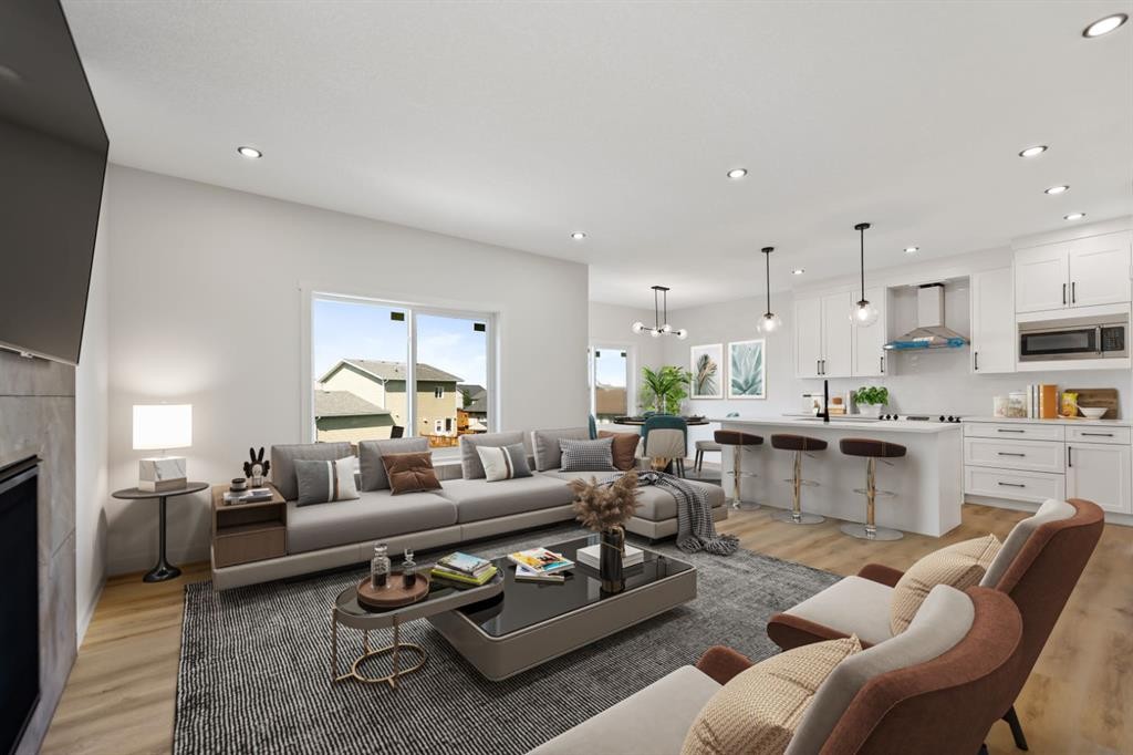 9 Mcclung Gate, Carstairs, AB - Indoor Photo Showing Living Room With Fireplace