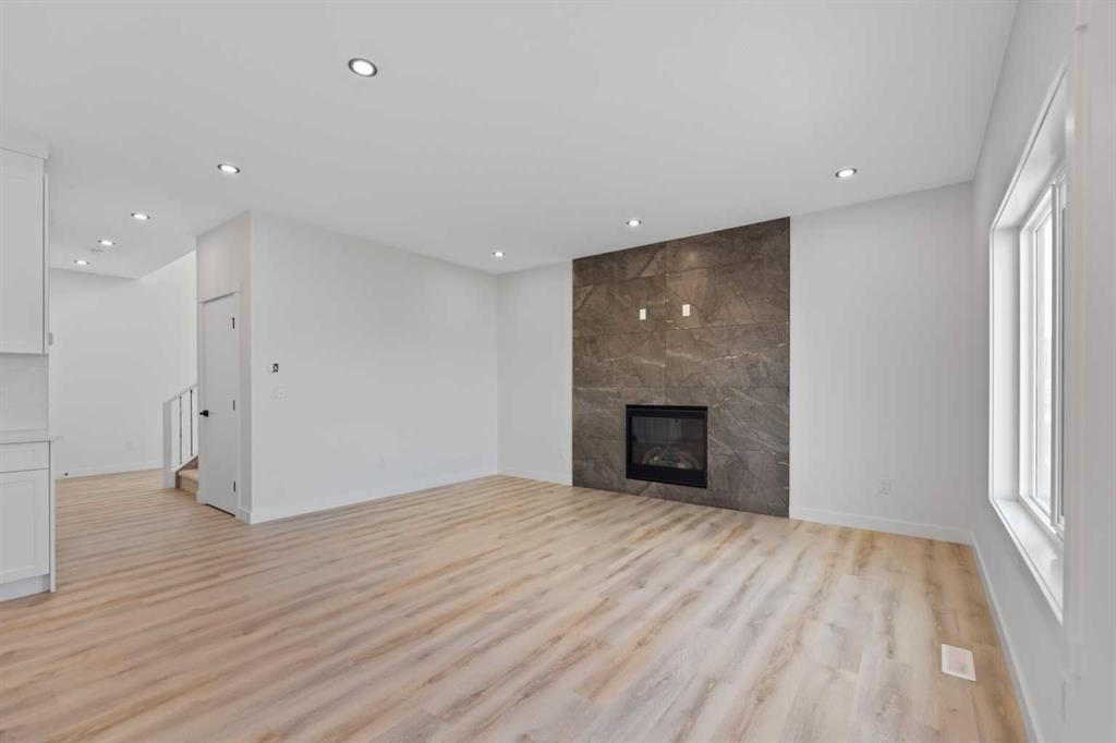 9 Mcclung Gate, Carstairs, AB - Indoor With Fireplace