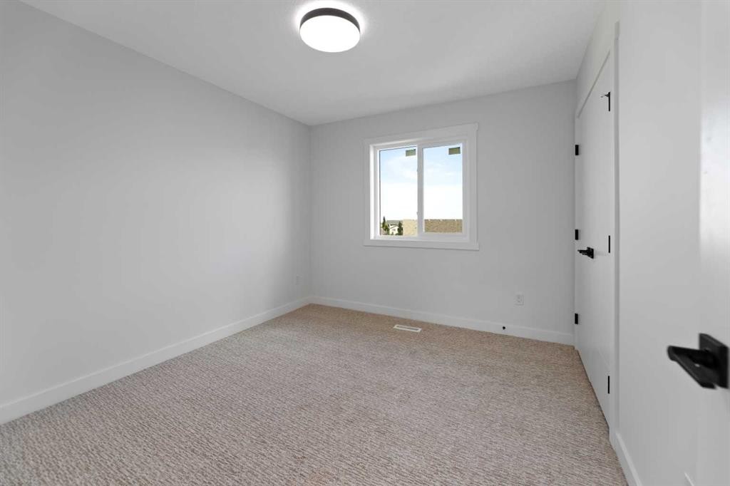 9 Mcclung Gate, Carstairs, AB - Indoor Photo Showing Other Room