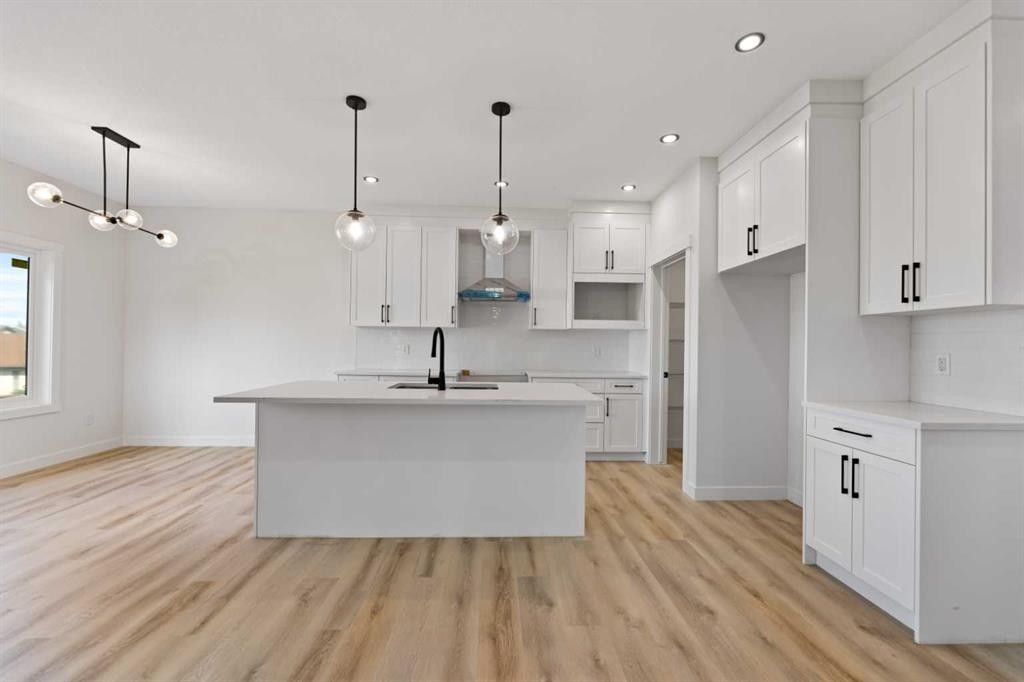 9 Mcclung Gate, Carstairs, AB - Indoor Photo Showing Kitchen With Upgraded Kitchen