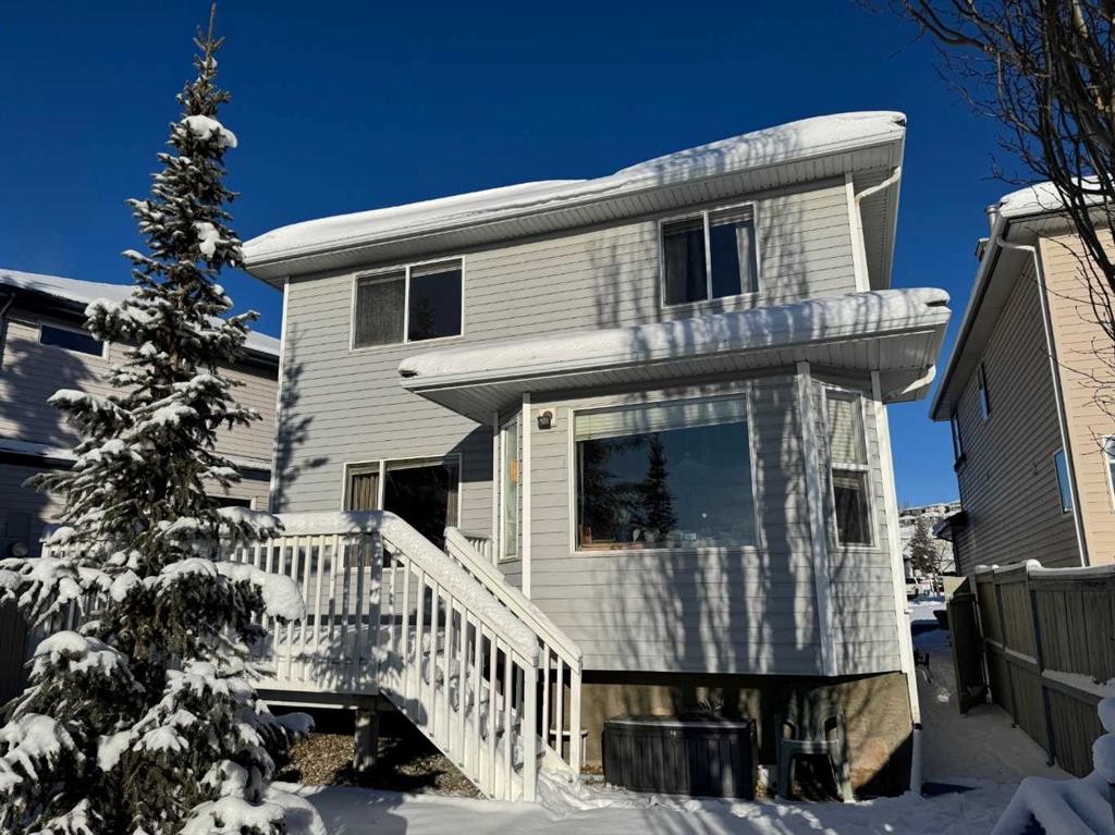 65 Spring Crescent Sw, Calgary, AB - Outdoor With Exterior
