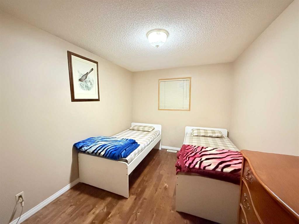 6946 Laguna Way Ne, Calgary, AB - Indoor Photo Showing Bedroom