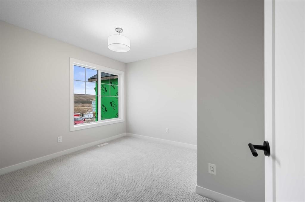 26 Walgrove Bay Se, Calgary, AB - Indoor Photo Showing Other Room