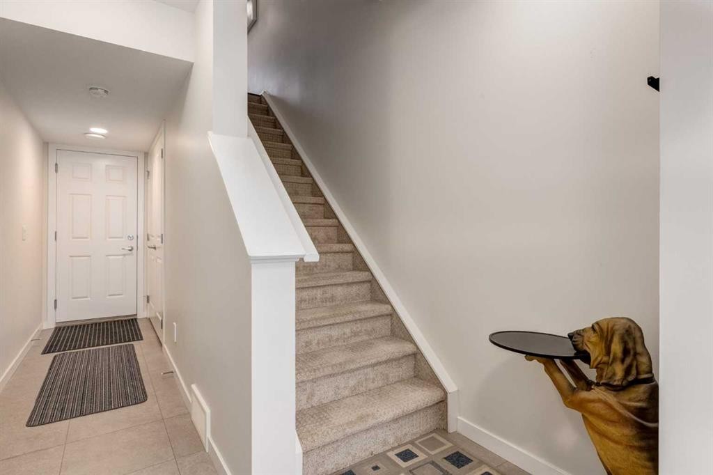 165 Sundown Road, Cochrane, AB - Indoor Photo Showing Other Room