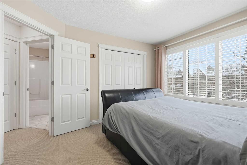 45 Somme Boulevard Sw, Calgary, AB - Indoor Photo Showing Bedroom