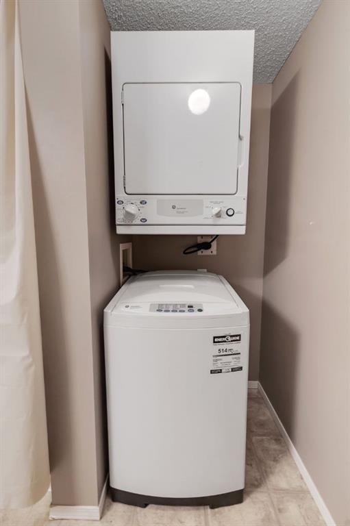 1109-505 Railway Street West, Cochrane, AB - Indoor Photo Showing Laundry Room