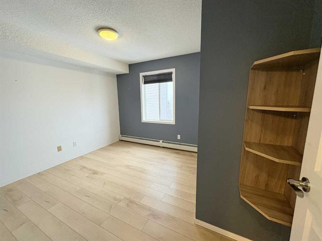 #418-4000 Somervale Court Sw, Calgary, AB - Indoor Photo Showing Other Room