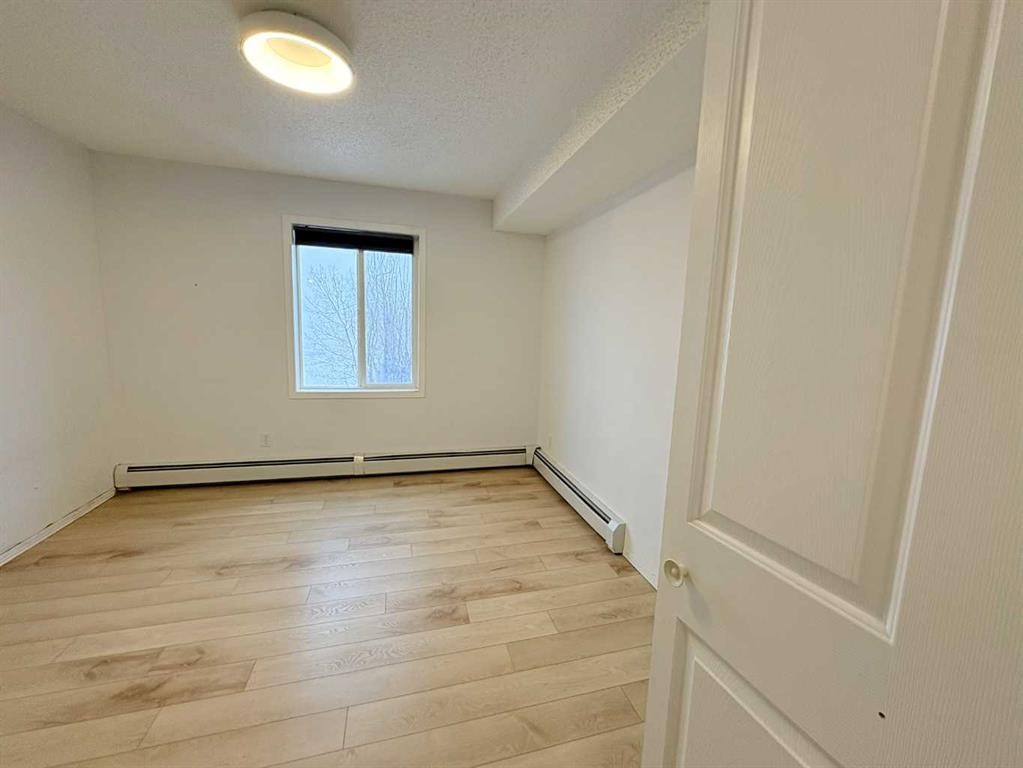 #418-4000 Somervale Court Sw, Calgary, AB - Indoor Photo Showing Other Room